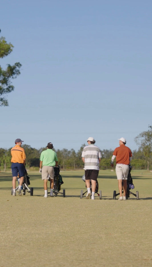 4 Golfers Walking the Open Course On a Golf Trip