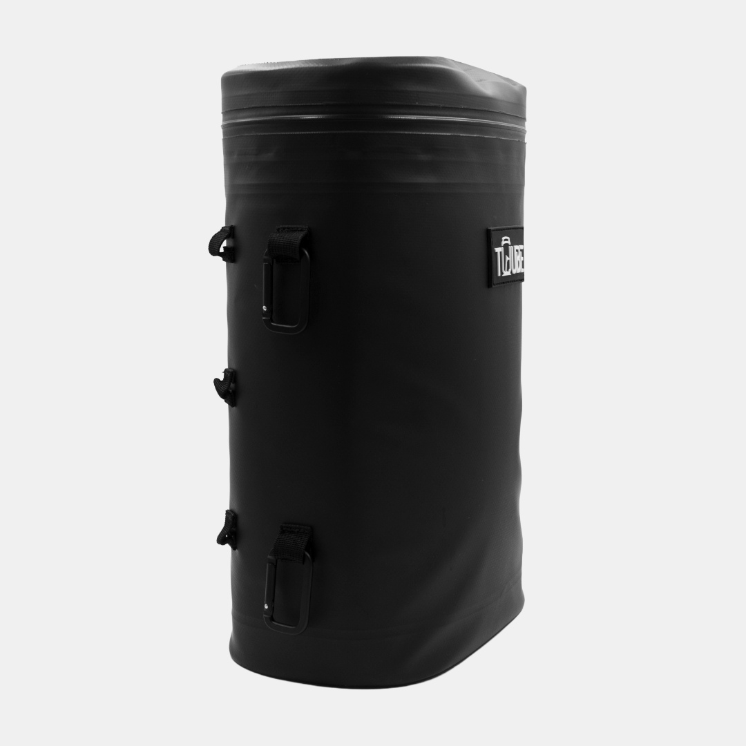 Tuube Weekender 8L black cooler bag with ruler reference showing 14.5cm width, 24.5cm length, and 34cm height in compact form factor