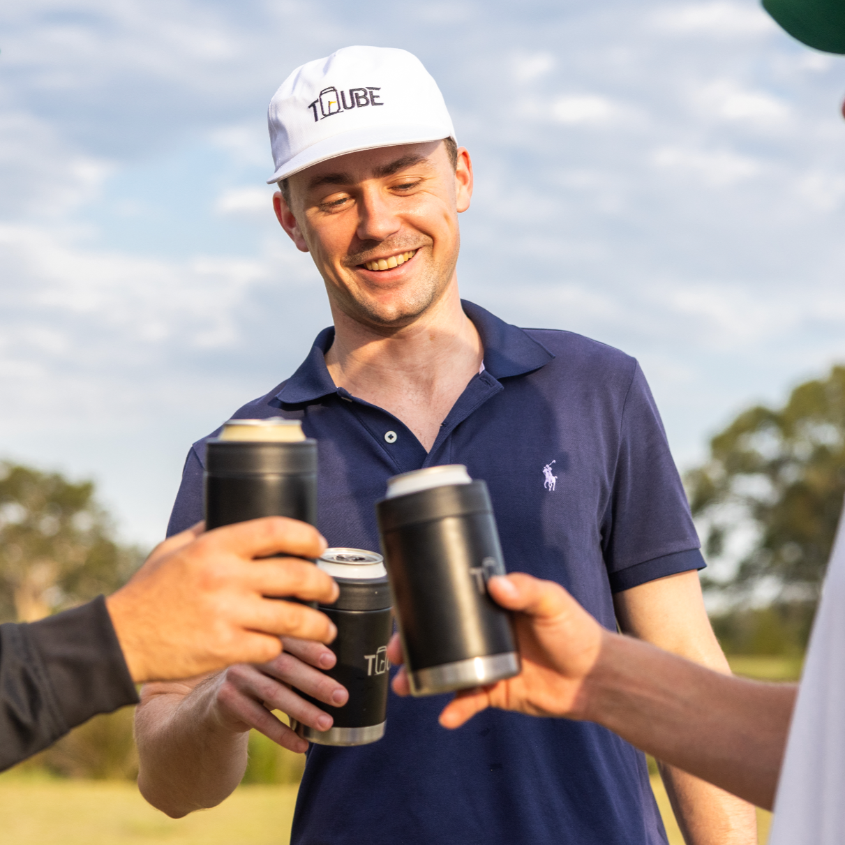 Black Tuube stainless steel cooler top-down view showing easy-twist gasket for secure closure during golf rounds and travel
