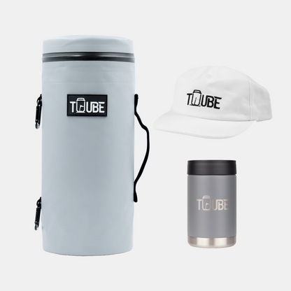 Grey Tuube Gift Bundle flat-lay showing grey Tuube 2.0 cooler bag, grey stainless steel cooler, and white hat on white background