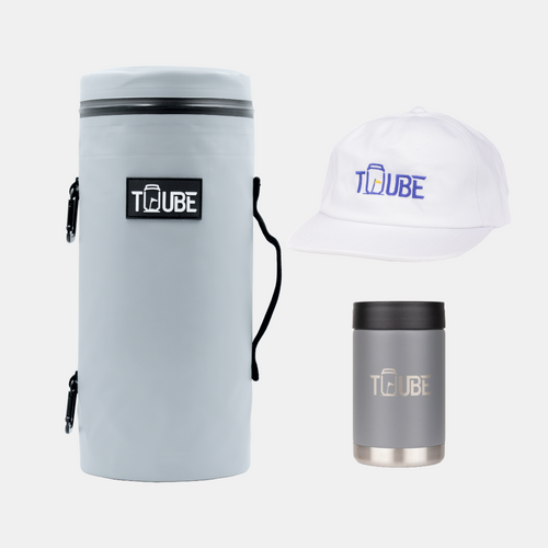 Grey Tuube Gift Bundle flat-lay showing grey Tuube 2.0 cooler bag, grey stainless steel cooler, and white hat on white background