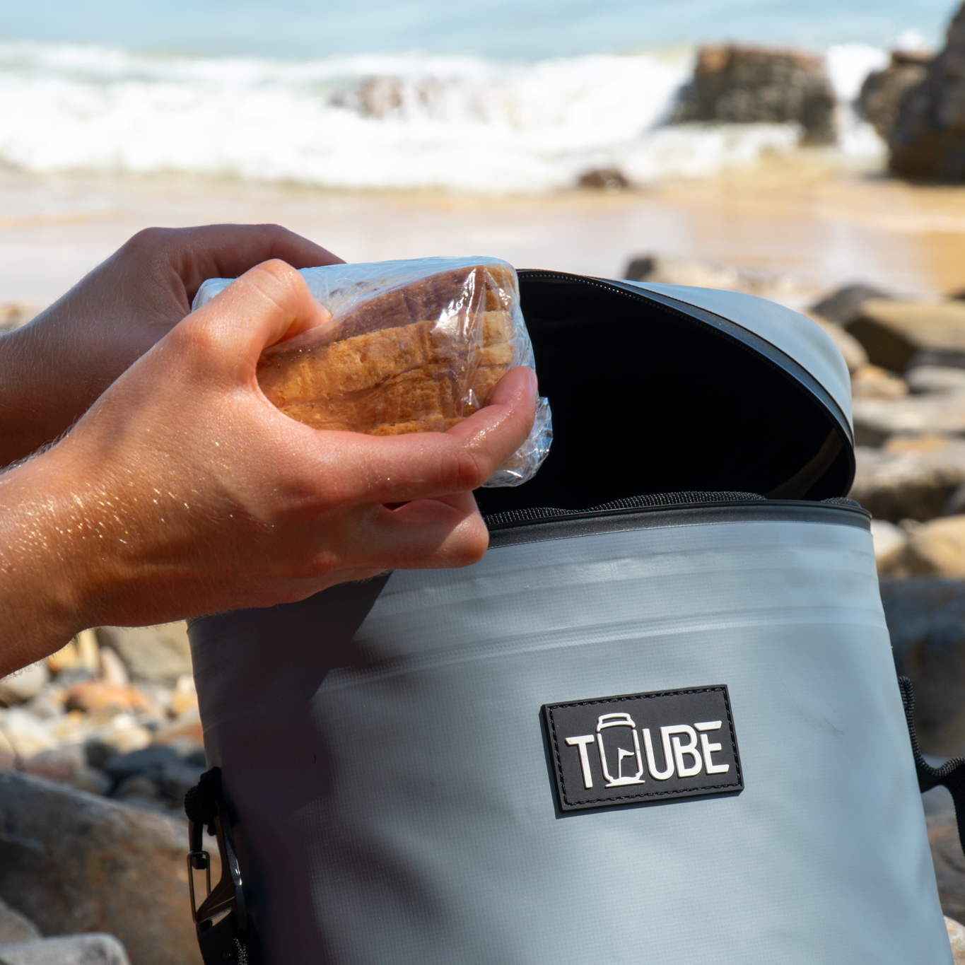 Tuube Weekender 8L grey cooler bag presented as a golf gift, compact standalone design suitable for golf trips, events, and Father's Day