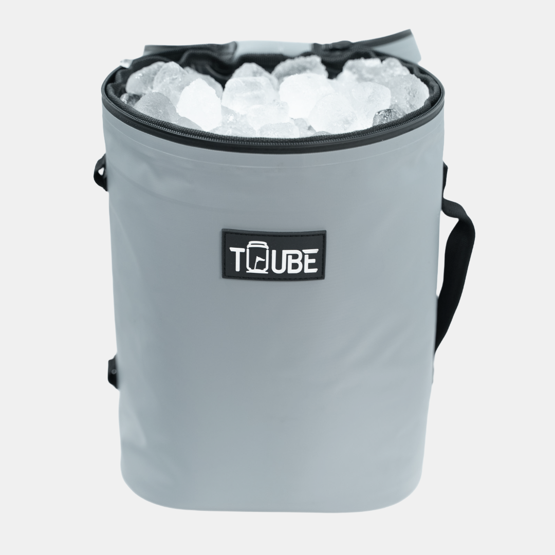 Interior of Tuube Weekender 8L grey cooler bag holding 12 cans plus ice, full 8L capacity with heat-welded inner seams visible