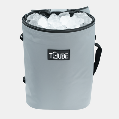 Interior of Tuube Weekender 8L grey cooler bag holding 12 cans plus ice, full 8L capacity with heat-welded inner seams visible