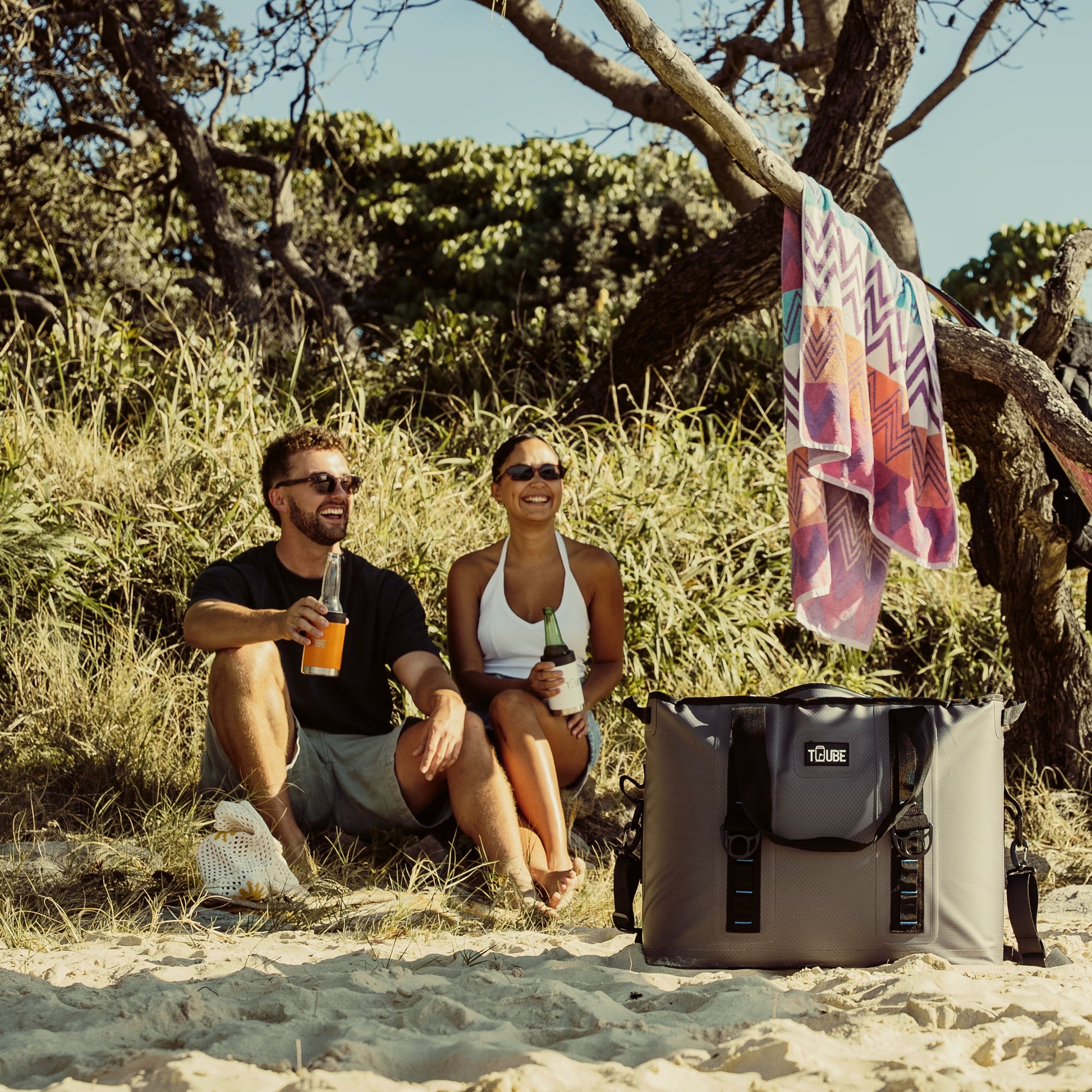 Tuube Traveller 36L cooler bag beside a vehicle at golden hour, full 36L capacity visible for overnight and multi-day trips