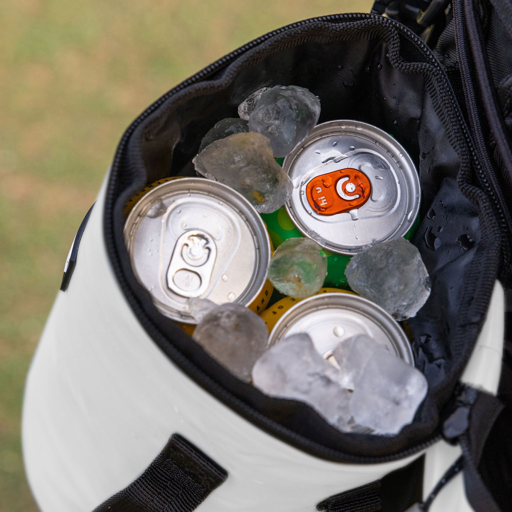 White Tuube Cooler Bag 2.0 detail view of leakproof zipper and carry handle, insulated golf bag cooler with heat-welded seams