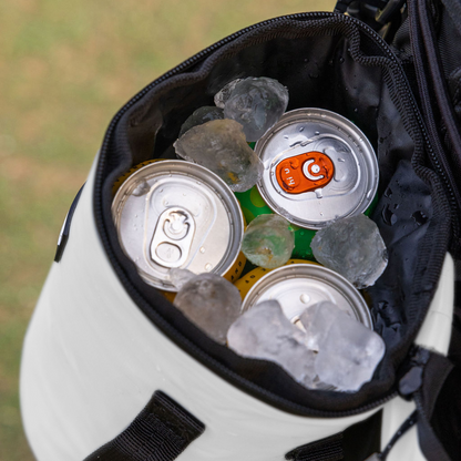 White Tuube Cooler Bag 2.0 detail view of leakproof zipper and carry handle, insulated golf bag cooler with heat-welded seams