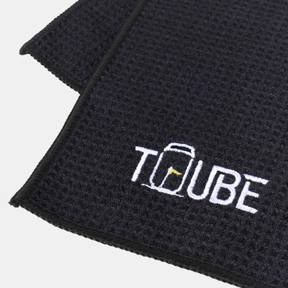 Black Tuube microfiber golf towel with carabiner clip, attaches to any golf bag for quick club and hand cleaning on the course