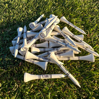 Tuube 54mm short golf tees 25-pack product shot, durable plastic tees ideal for irons and fairway woods, Tuube-branded