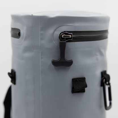 Grey Tuube Cooler Bag 2.0 closeup showing heat-welded seams, carry handle, and leakproof zipper, attachable golf bag cooler